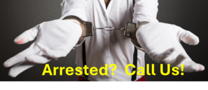 person wearing white gloves and wearing handcuffs