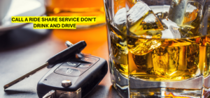 ALCOHOL IN A GLASS AND CAR KEYS NEXT TO THE GLASS