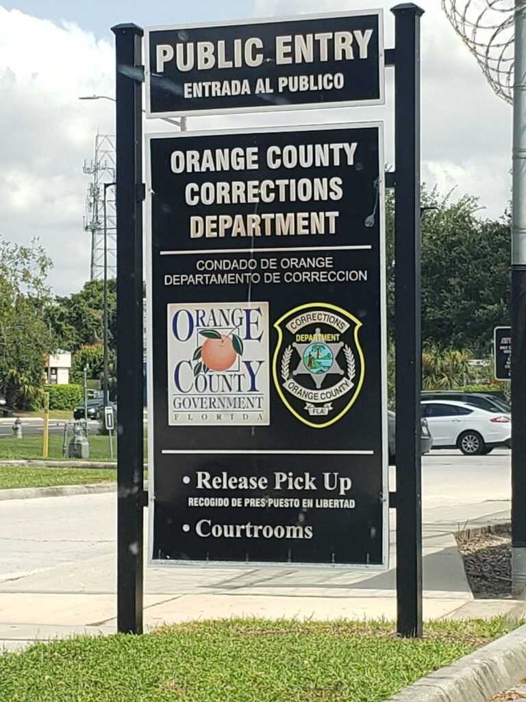 Orange County Florida sign in parking lot for corrections